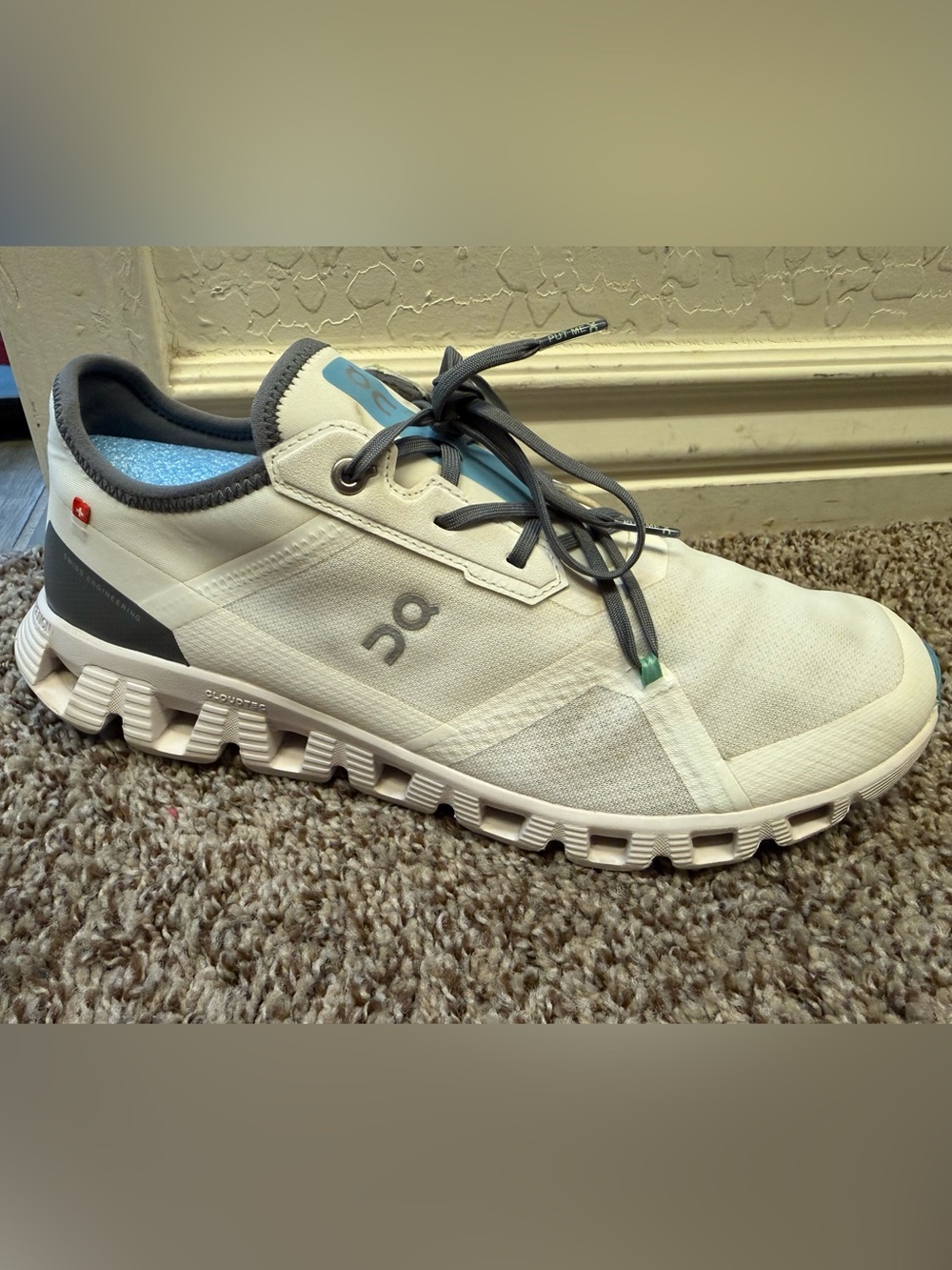 On Running Men’s Cloud Sneaker in White with Gray and Light Blue Accents